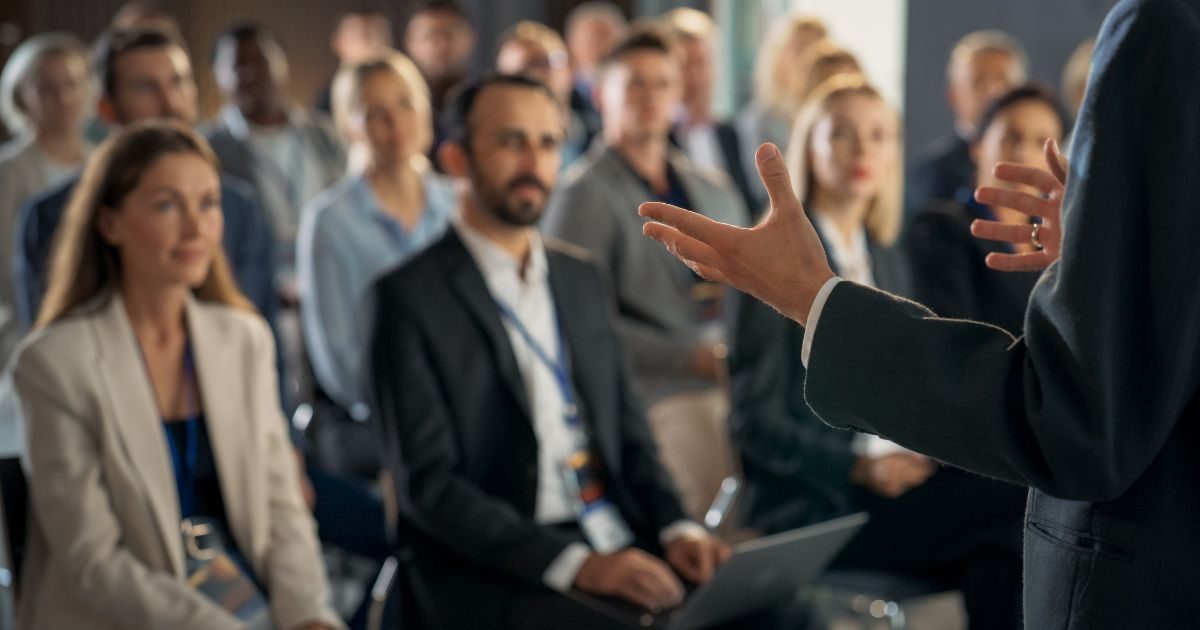 Business people attending a presentation skills training course