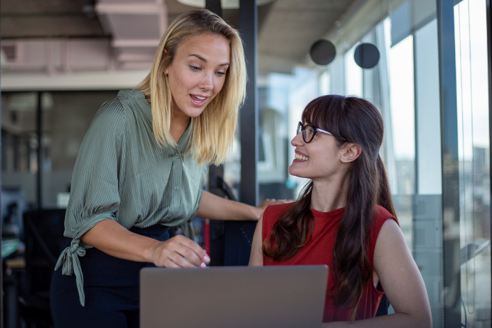 A women giving effective feedback to her colleague