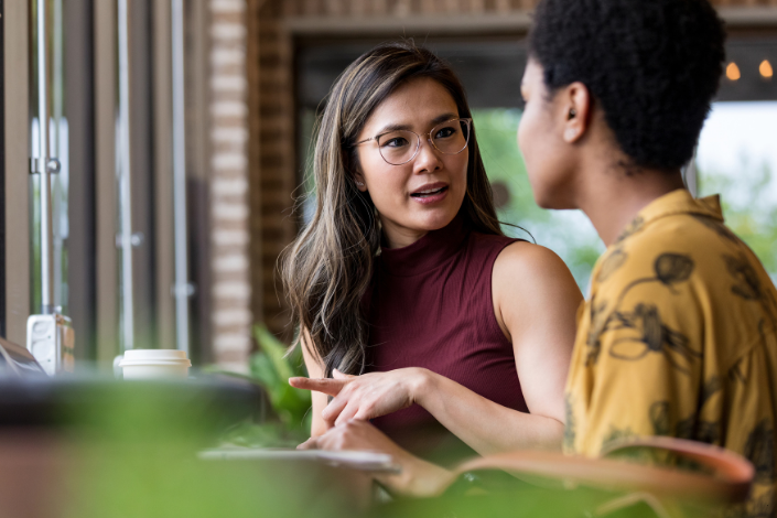 two people having a difficult conversation at work